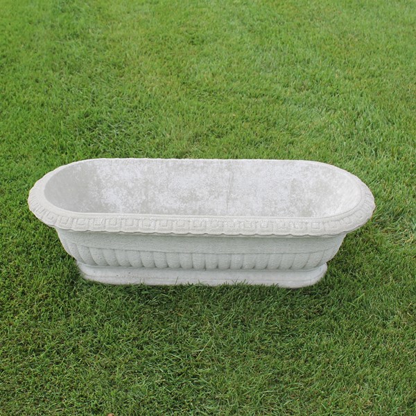 A long oval elongated planter with a traditional look. 