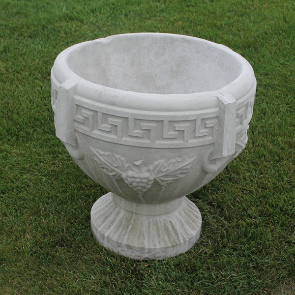 An extra large grecian planter which features a geometric design band and the grape and vine design. 