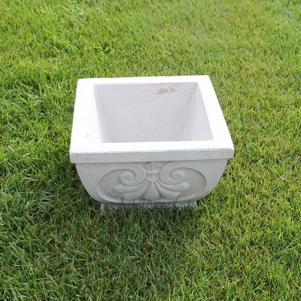 A small Normandy square garden planter with high-relief acanthus detailing.