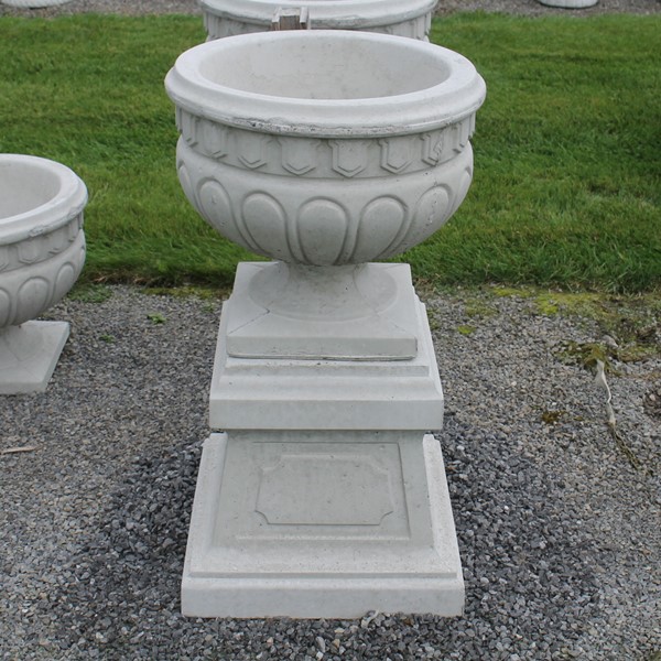 A large Roman Planter and Large Base 