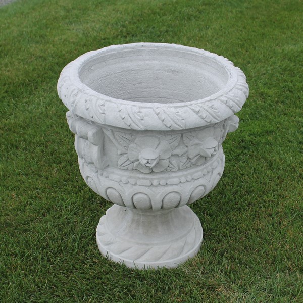 One piece, extra large, rose detailed planter. 