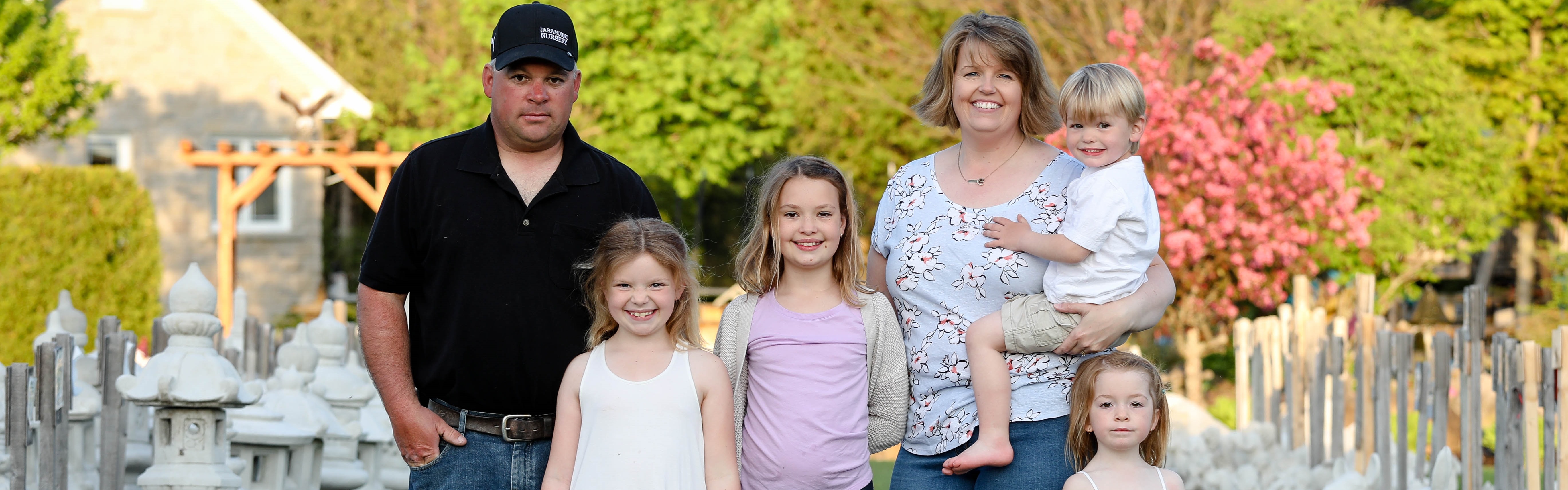 Corey Rousson and family together in the backyard at KB Backyard Depot Three Generations of Roussons in their backyard at KB Backyard Depot