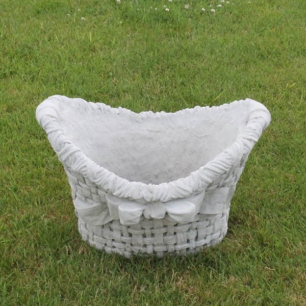 A woven look, oval shaped basket planter 