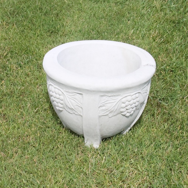 This small Waldensian planter is circular with grapes and vines decorating the outside 