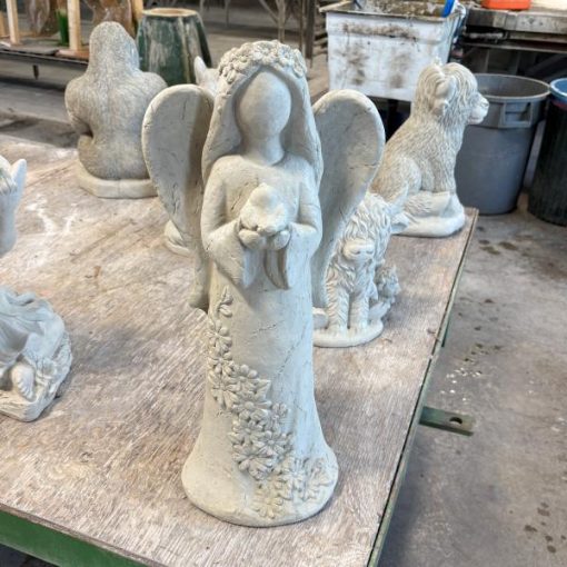 Faceless Angel holding Bird N Concrete Garden Supply