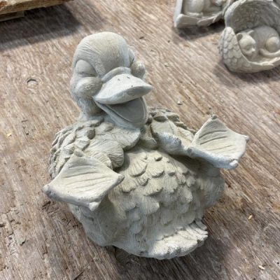 Laughing Duck on Back N Concrete Garden Supply