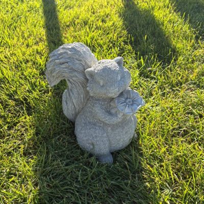 Skunk or Squirrel with Flowers
